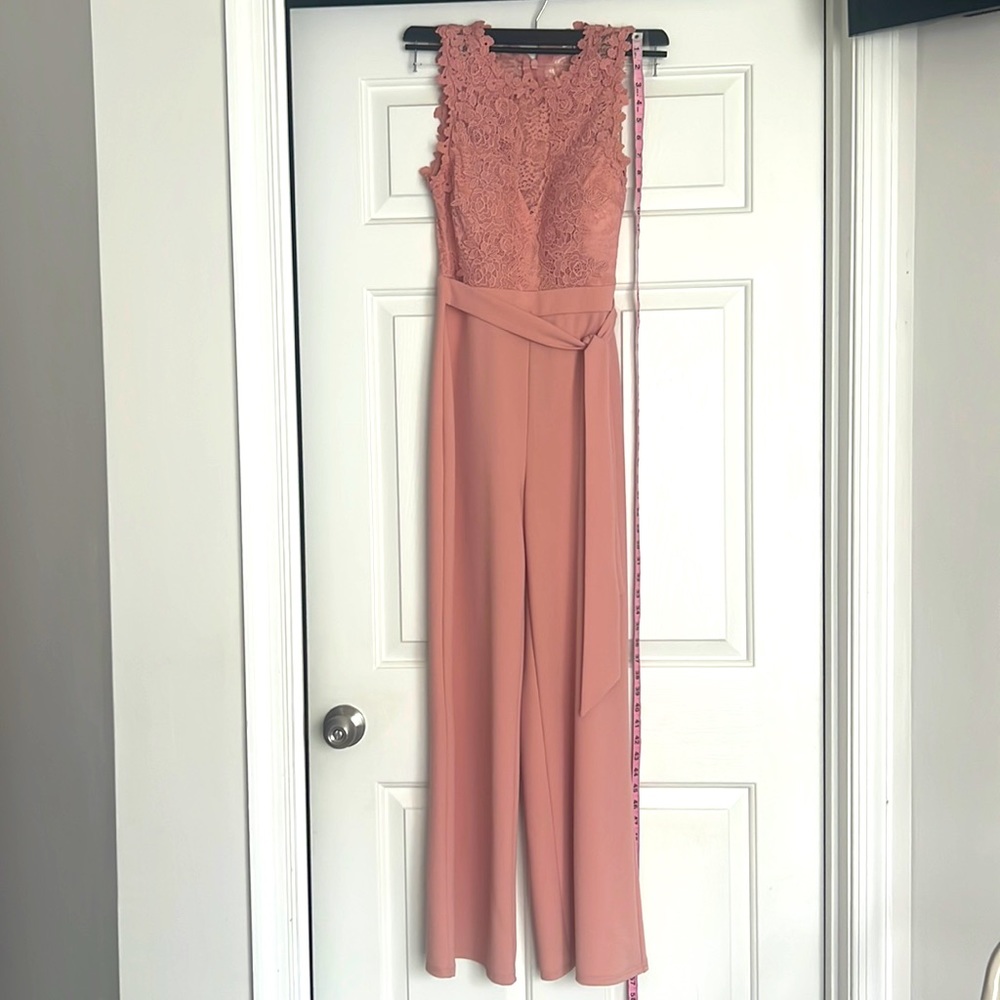 Beautiful blush pink lace jump suit from fashion nova
